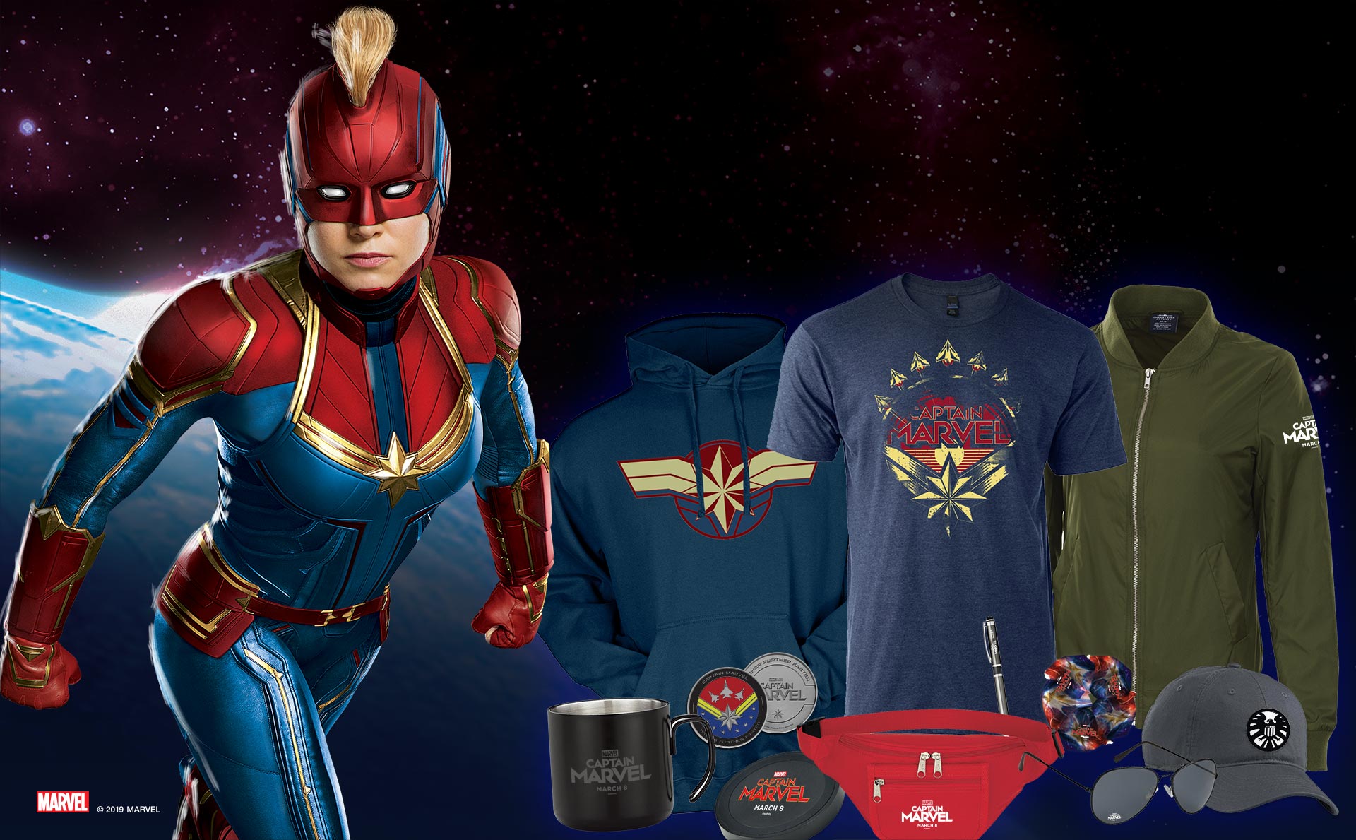 Disney Captain Marvel Promo Item rendering with t shirt, bomber jacket, hat, sunglasses, coin and pen